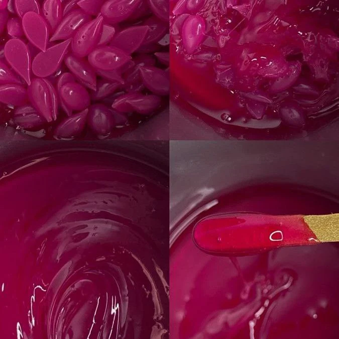 Spezialist trägt geschmolzenes Granulatwachs auf die Haut auf