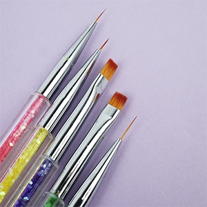 Dual-ended nail brushes